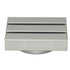 A modern square cabinet knob with a brushed silver finish, featuring three horizontal recessed slots on its top face and a circular mounting base.