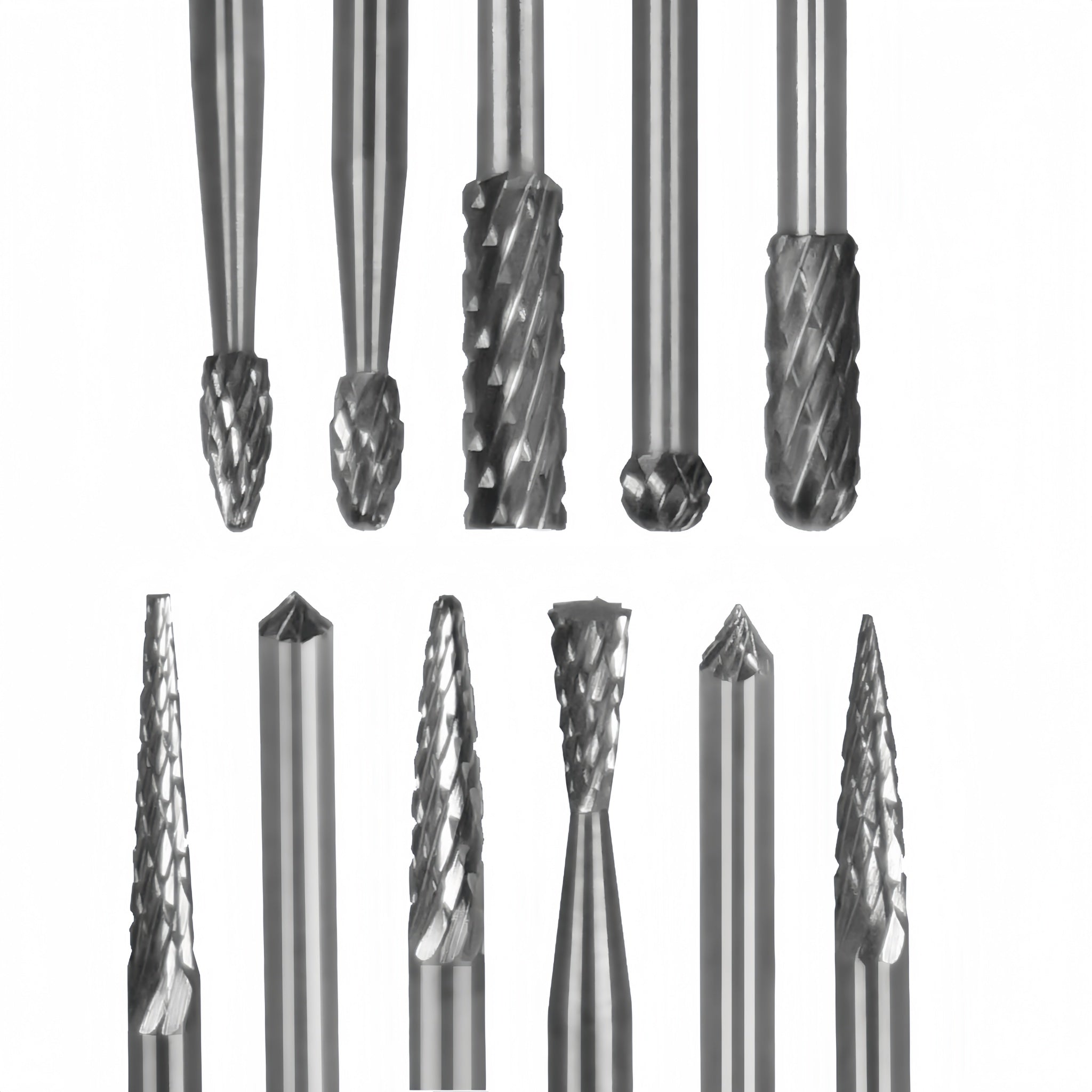Collection of various metal burrs on a white background