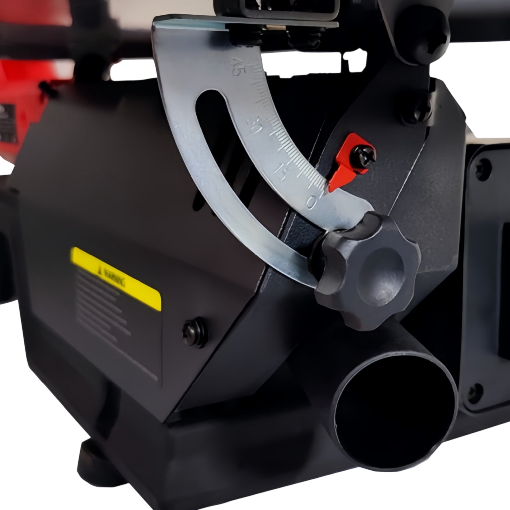 Close-up of the tilting adjustment dial, red safety switch, and metal pipe opening against a white background.
